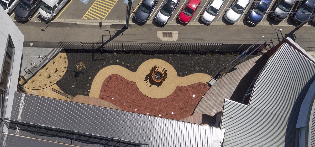 A landscaped fire pit area at the Ballarat and District Aboriginal Co-operative Medical and Regional Health Hub
