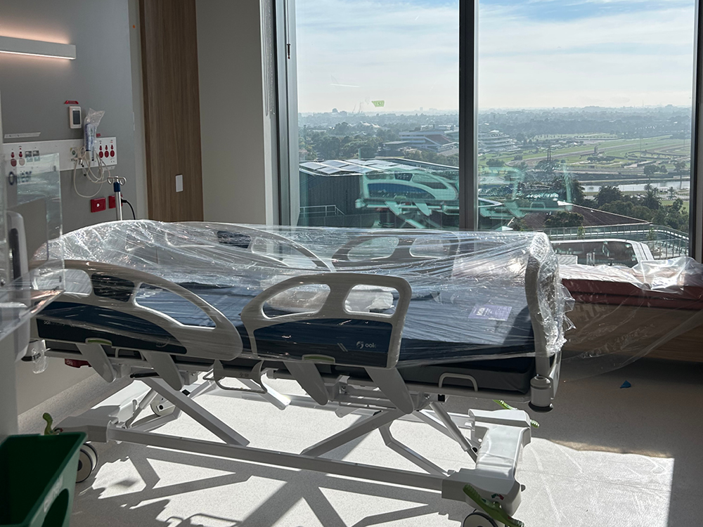 A new hospital bed still in its packaging