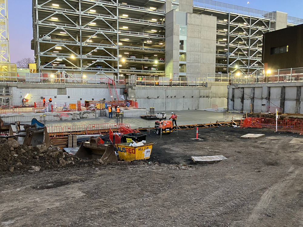 concrete slabs being poured on a construction site