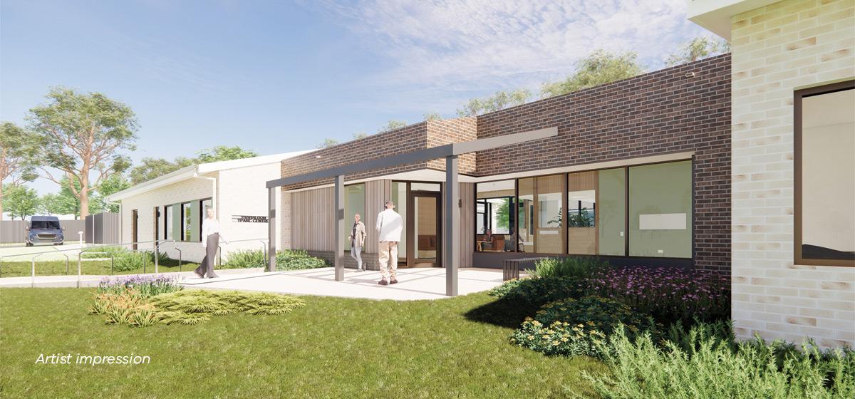 Artist impression of a building with a brick exterior and open grassy space surrounding it