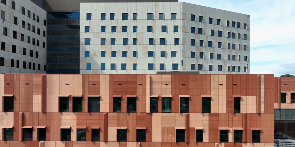 The earth-toned facade of the Frankston Hospital redevelopment