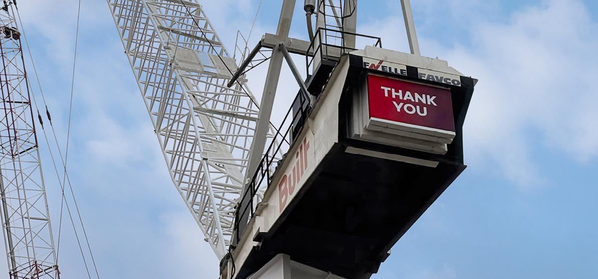 Crane with sign saying 'thank you'