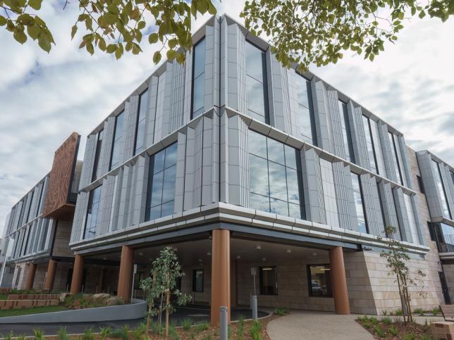 Exterior of the Maryborough Hospital, with large windows and silver facade panels