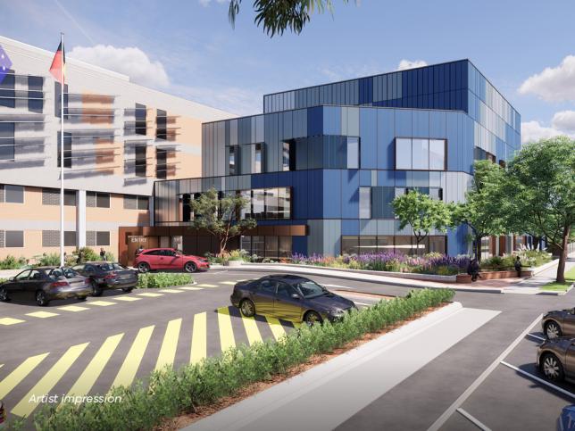 A carpark out the front of a new hospital complex