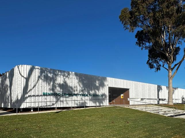 A building with a unique white facade