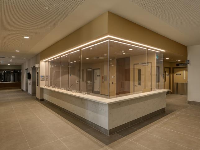 A sleek reception area with strip lighting