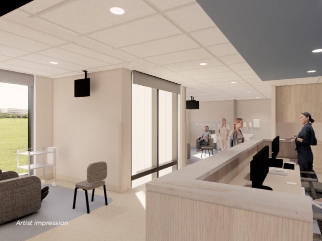 A clean modern space with reception area and chairs