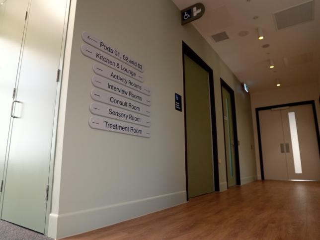 A hallway with signs