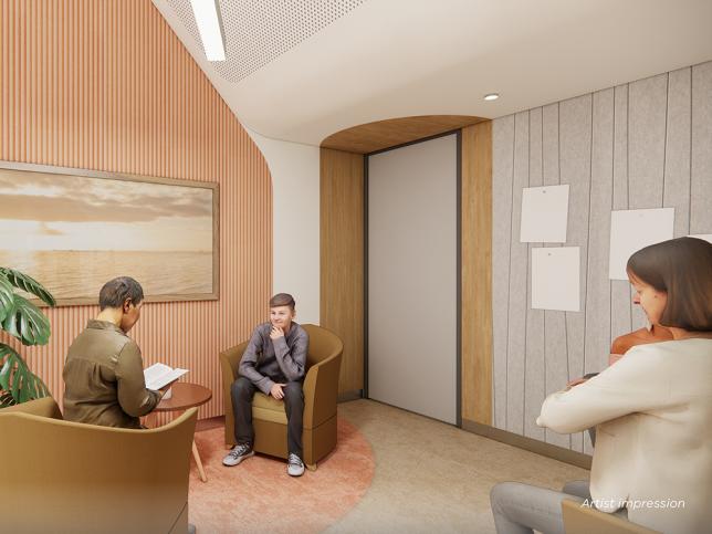 Three people in a room chatting