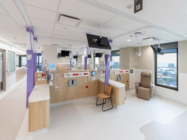 A hospital area with large windows