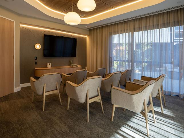 Room with curtains and chairs