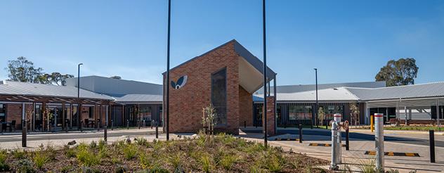 Exterior of the Rutherglen aged care facility, with a brick facade and corrugated roofing