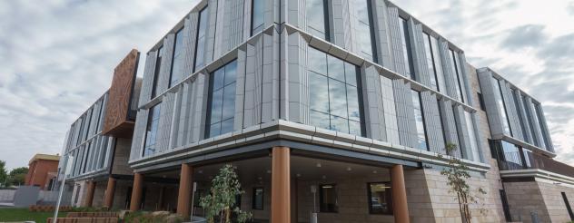 Exterior of the Maryborough Hospital, with large windows and silver facade panels