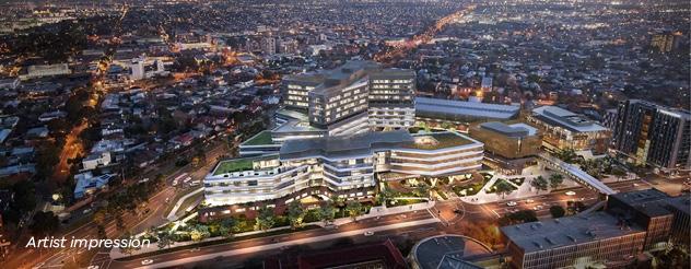 Artist's impression of bird's eye view of a large building surrounding by glittering lights at night