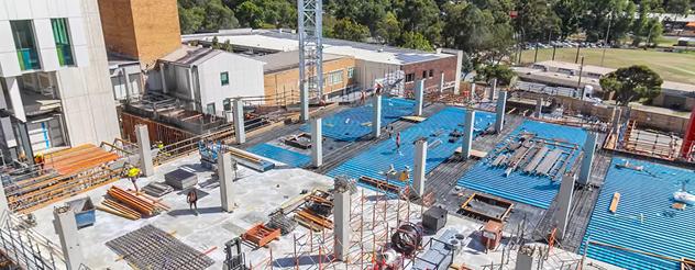 View from above of construction site with vertical structures