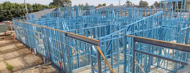 Blue construction beams on a work site