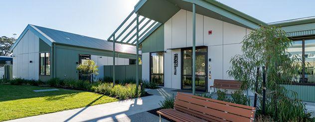 Shepparton YPARC entrance with a bench and native garden
